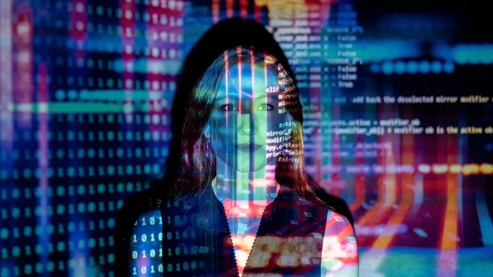 Image of a woman with computer code projected over her